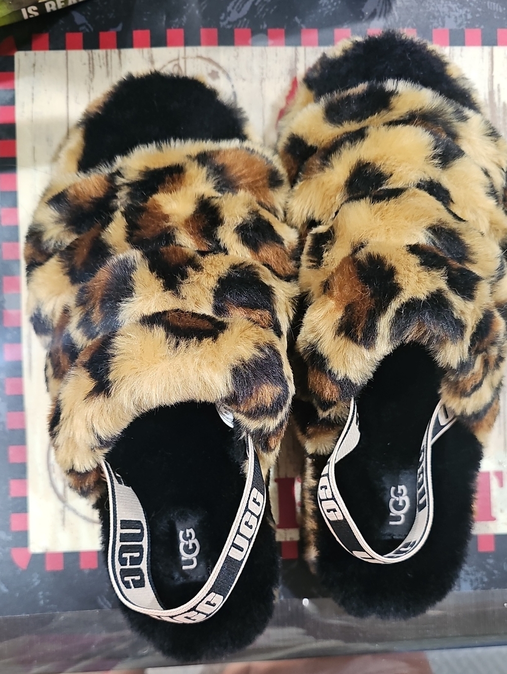 UGG Leopard Faux-Fur Slide Slippers in Black and Tan